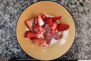 Letting strawberries soak into the cream before blending makes the blending process quicker.