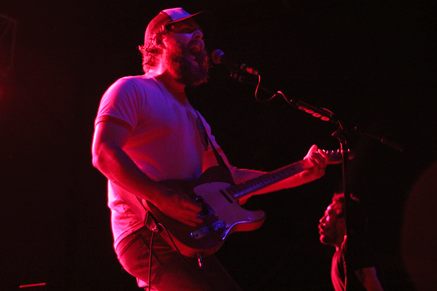 As he screams into the microphone, Manchester Orchestra lead vocalist-guitarist Andy Hull performs with the band at CrossroadsKC. Manchester Orchestra headlined Day Four of Middle of the Map Fest.
