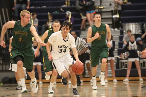 Boys basketball teams winning streak comes to an end