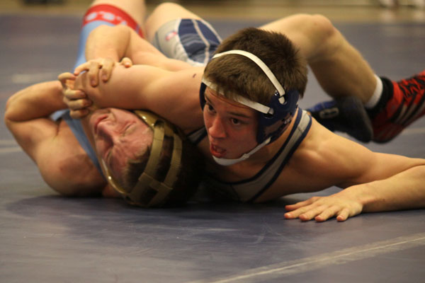 Wrestling team beats Shawnee Heights High School 43-36