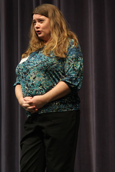 Opera singer performs for choir and band students