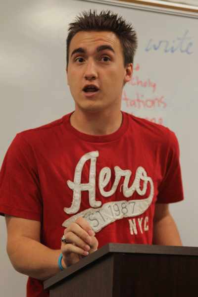 Preparing for the state meet, senior Alex Reeves particpates in an in-class mock debate. 