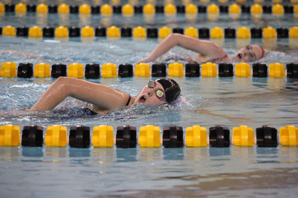Inaugural girls swim team works to improve abilities