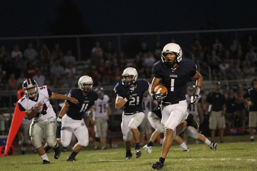 The football team defeated Manhattan High School 26-21 in the first game of the season on Friday, Sept. 6.