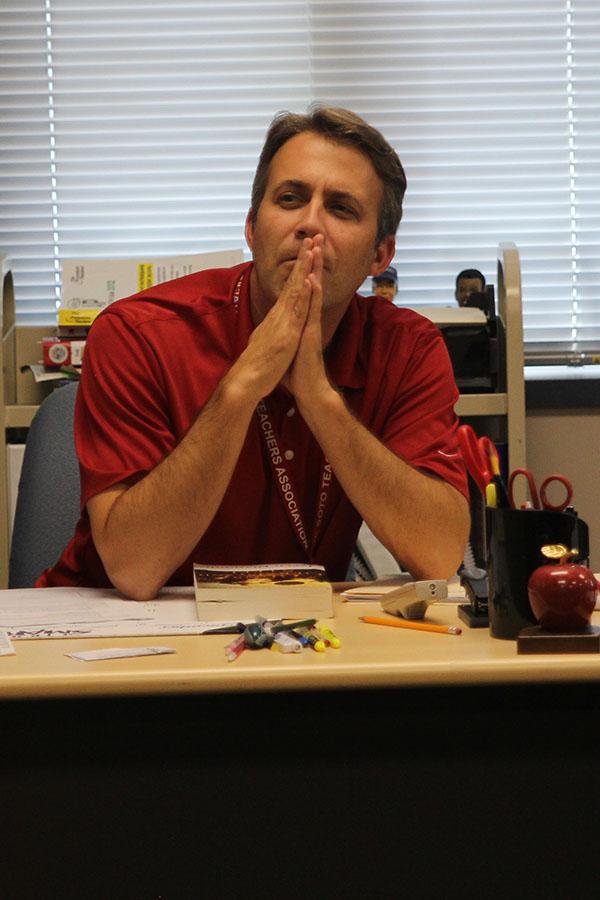 Overseeing the meeting on Tuesday, Sept. 10, sponsor Jeff Wieland watches club members interact.