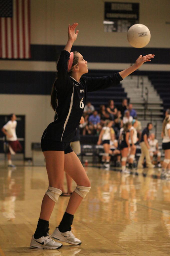 The varsity volleyball team defeated both Blue Valley and Lansing at their home triangular on Thursday, Sept. 12. The girls won the first match 25-13 against Blue Valley and 25-21 in the second. Lansing was defeated 25-8 and 25-20 in the first and second matches.  Photos by Halie Rust