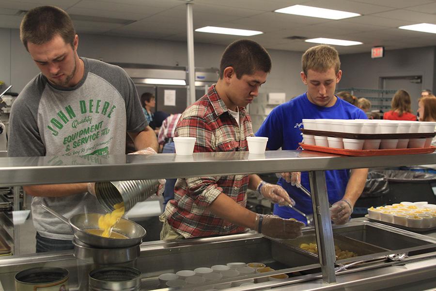 Seniors prepare and serve food to those who cannot afford it on Tuesday, Oct. 8.