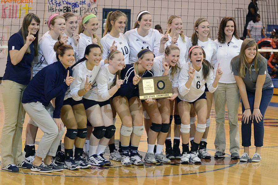 The+volleyball+team+poses+with+its+substate+trophy+on+Saturday%2C+Oct.+26.