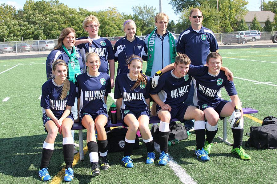 The Mill Valley Unified soccer team poses with Sporting Kansas City defender Seth Sinovic on Sunday, Oct. 20.