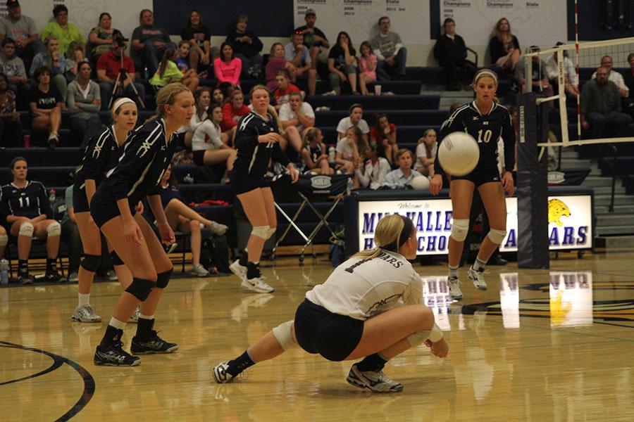 Senior libero Abby Ford dives to make a pass in the Jaguars game against Lansing on Tuesday, Oct. 8. The Jaguars won all three sets.