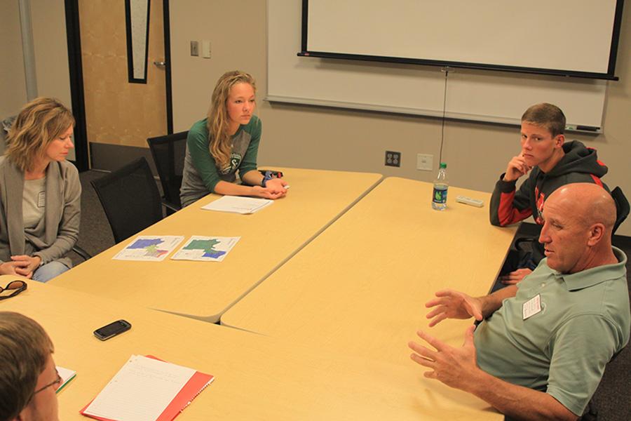 Boundary committee members juniors Maddie Butterfield and Callahan Eckardt meet with fellow members Gretchen Ceule and Scott Hancock to discuss future committee plans.