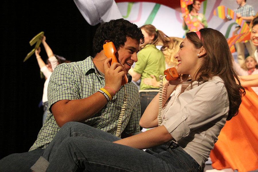 Junior Adam Segura gazes lovingly into the eyes of senior Olivia Phillips during the song “Telephone Hour.” 