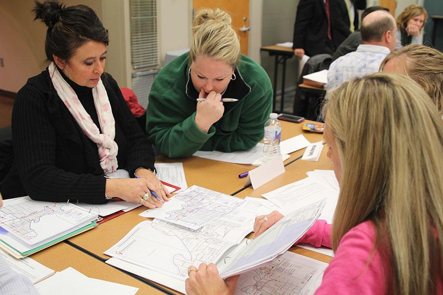 District Boundary committee members go over the possible boundary changes for next year at the committee meeting on Thursday, Dec. 5.