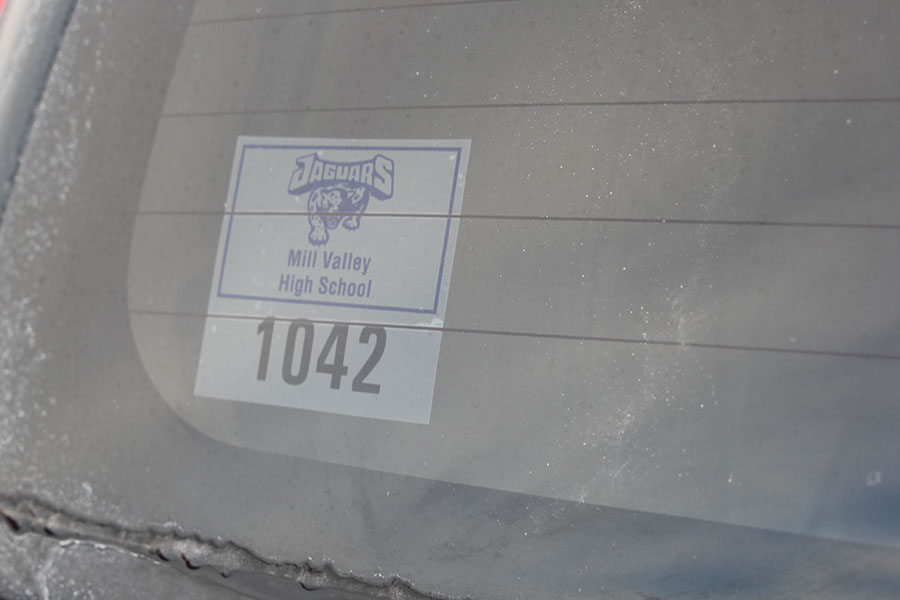 Identified+by+the+parking+sticker%2C+this+car+is+permitted+to+park+and+avoids+the+fine+of+%245+if+such+identification+is+absent.