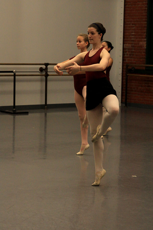 Sophomore Virginia Smith focuses on her form during a dance rehearsal on Friday, Dec. 6. 