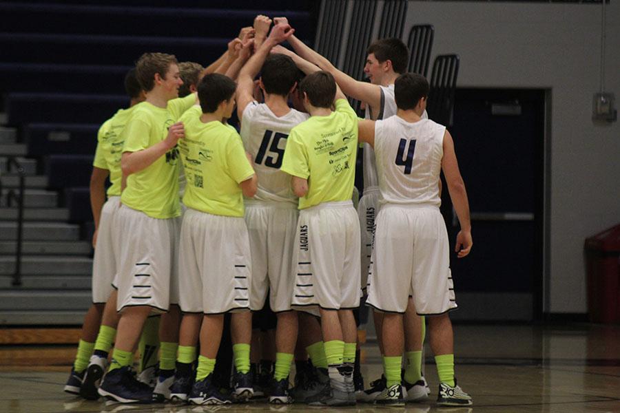 The boys basketball team defeated Olathe Northwest 59-46 on Saturday, Feb. 15.