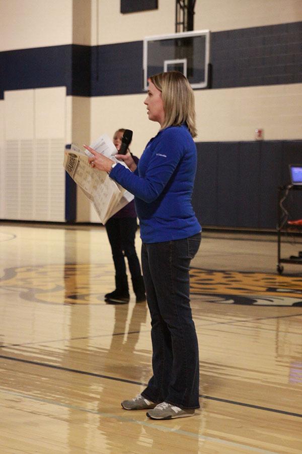 Counselor Erin Hayes instructs the junior class on course selection for their senior year.