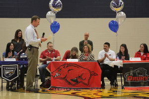 Athletes sign letters of intent in group signing ceremony