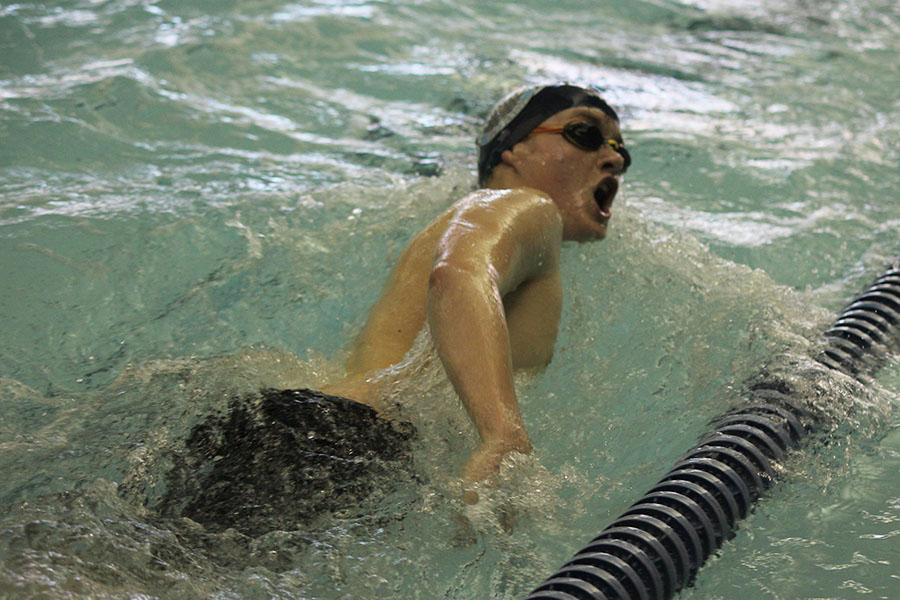 Sophomore Richard Wooten competes in an event at the Kaw Valley League championship on Tuesday, Feb. 11.
