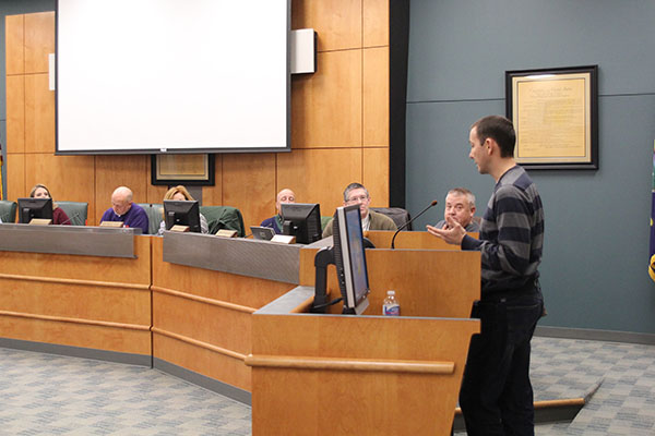 Boundary committee member Will Stelle addresses the School Board before it begins its discussion of boundaries on Monday, February 10.