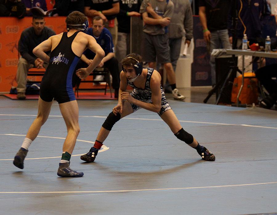 Senior Landon Scott wrestles in semifinals at Hartman Arena on Friday, Feb. 28.