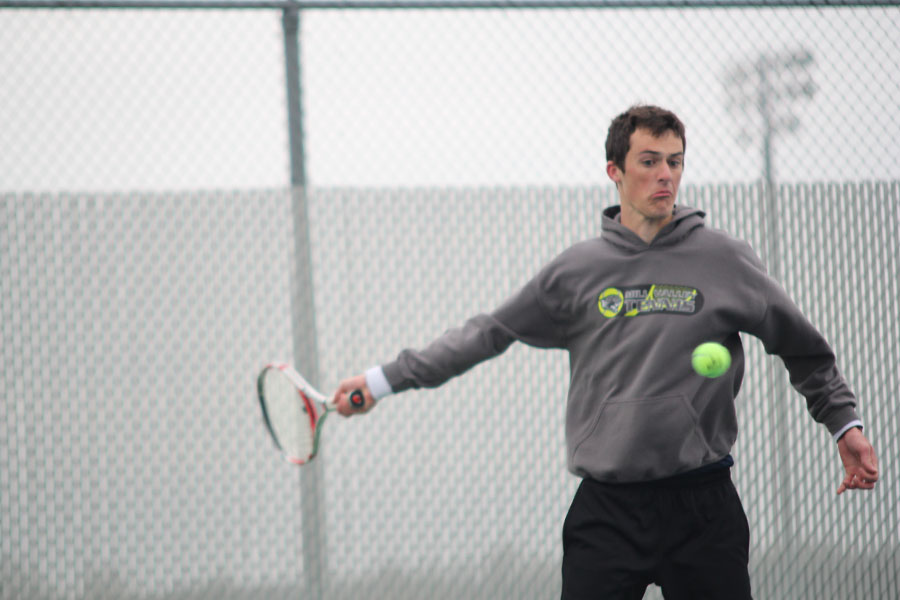 Seniors Joe Vincent and Connor Mills compete at the home tournament on Friday, April 4.