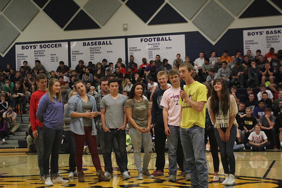 In recognition of their nomination, senior prom candidates participate in a improvisational skit during a pep assembly on Tuesday, April 29.