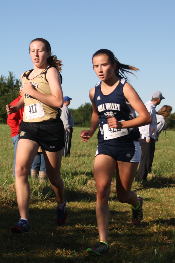 Both varsity cross country teams placed in the top three at Paola invitational Saturday, Sept. 13.