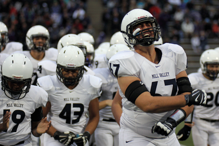 Senior Evan Applegate gets fired up before the football game vs. Blue Valley Northwest. The team lost 34-26.