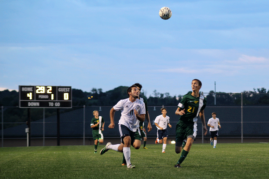 Senior+Cameron+Rohr+chases+the+ball+during+the+game+against+Basehor-Linwood+on+Tuesday%2C+Sept.+23.+