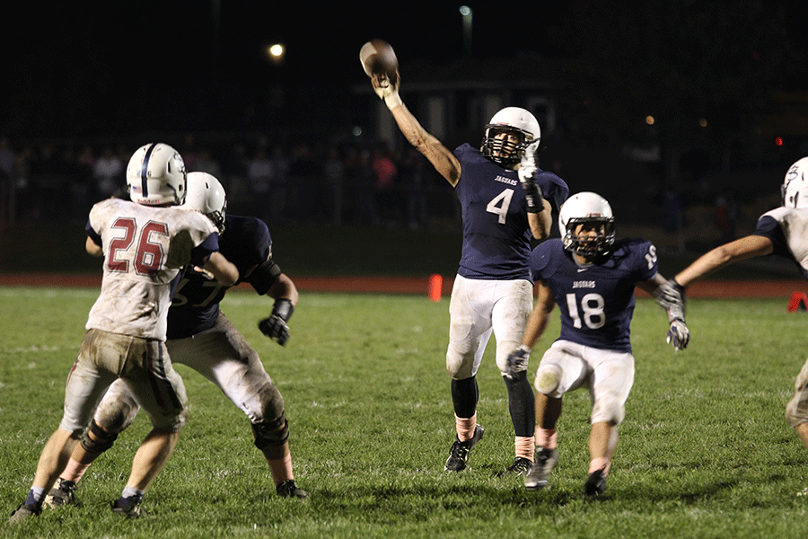 Throwing the winning touchdown to wide receiver Christian Jegen, quarterback Logan Kochs pass ends the game against Saint James Academy with a final score of 17-14.