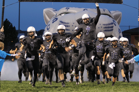 Football team wins Homecoming game 57-7