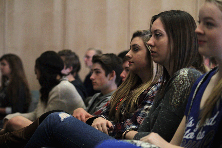 While at the Gift of Life rally on Thursday, Oct. 30, sophomore Kelsey Poje listens attentively to guest speakers.