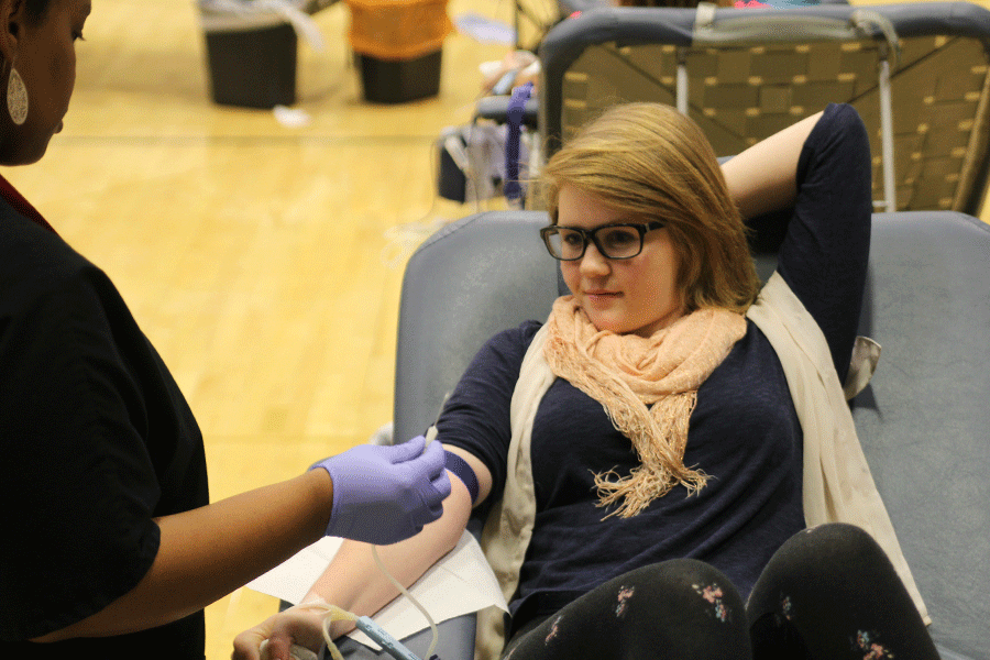 On+Thursday%2C+Oct.+23%2C+senior+Laci+Moore+donates+blood.+StuCo+holds+a+blood+drive+twice+a+year+with+the+Community+Blood+Center.++