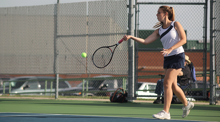 Finishing off a close doubles match of 6-8 on Monday, Oct. 6, senior Mikaela McCabe remains focused and sharp. 