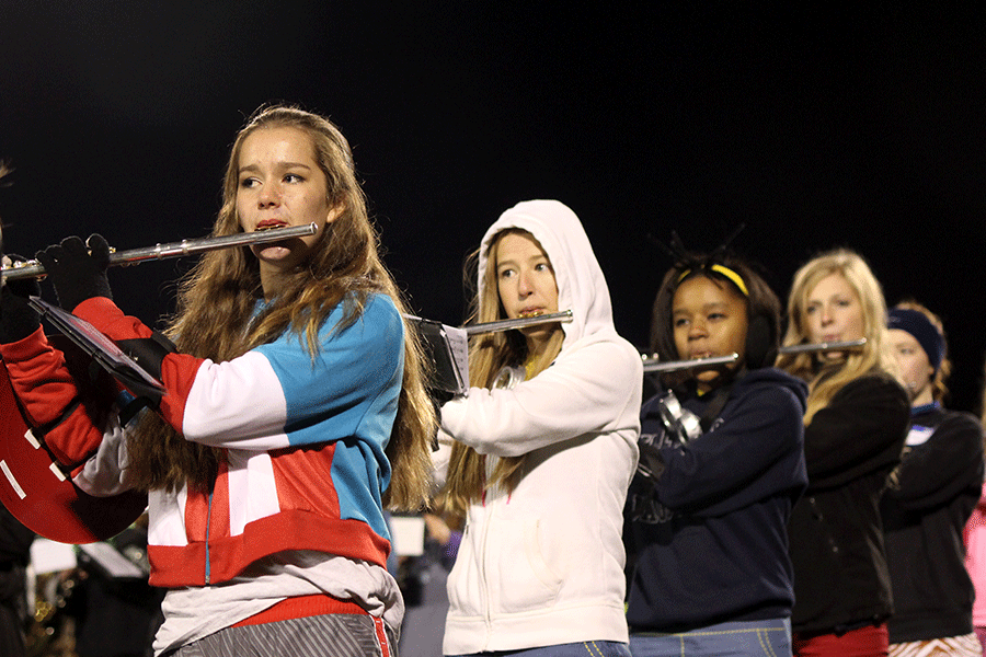 Junior Niamh Pemberton performs Thriller with the band during halftime at the football game on Friday, Oct. 31.