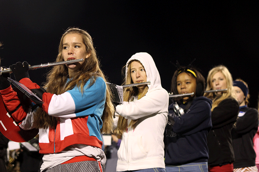 Junior Niamh Pemberton performs "Thriller" with the band during halftime at the football game on Friday, Oct. 31.