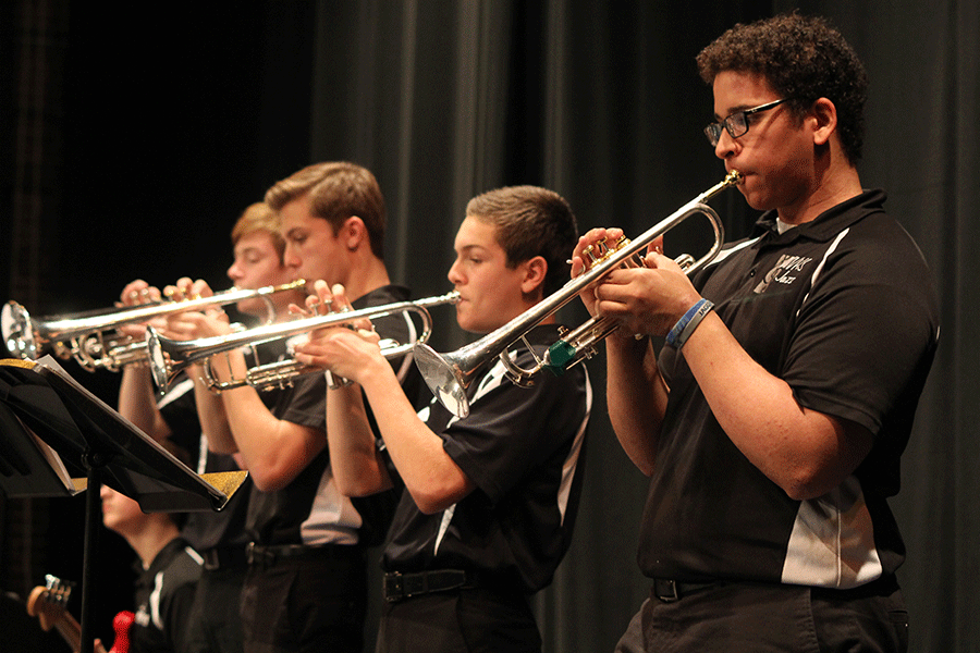 Senior Willie Reed plays Sir Duke on his trumpet with the Jaguar Jazz Band at Baker University Jazz Festival on Friday, Nov. 21. Mill Valley earned a rating of 2 at the festival.