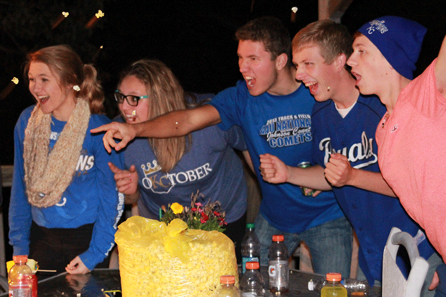 Senior Tessa Wahlmeier, 2014 graduate Ali Sprauge, senior Cody Deas and Devan Thomas and junior Hawkeye Mitchell celebrate the Royals win on Friday, Oct. 24.