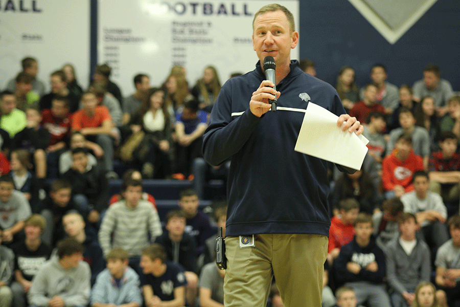 Associate Principal David Ewers gets the crowd  going for the Fall Recognition sports assembly on Nov. 24.
