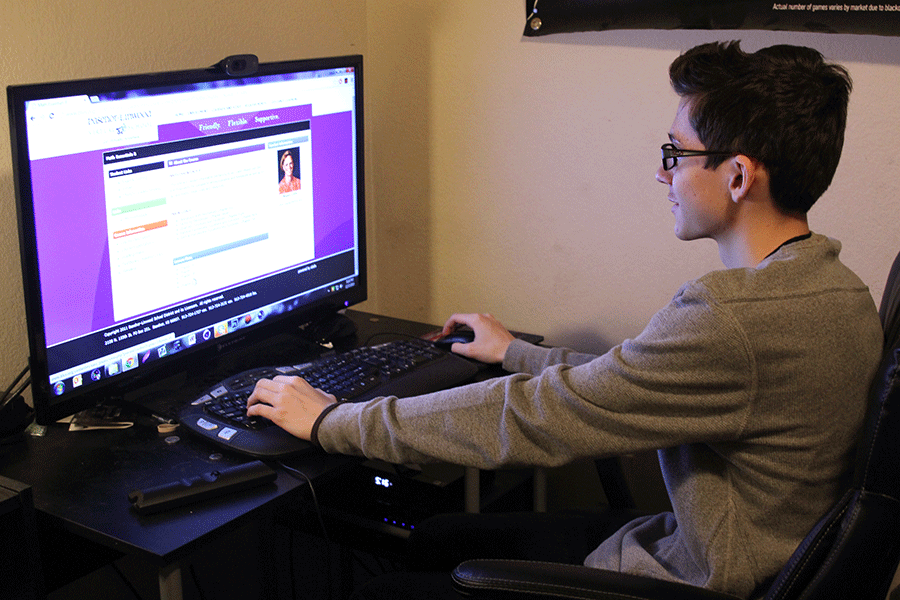 To complete his online Algebra class, sophomore Austin Sanchez sits at his computer on Wednesday, Dec. 3 to complete the normal school day on the Basehor-Linwood Virtual School website.