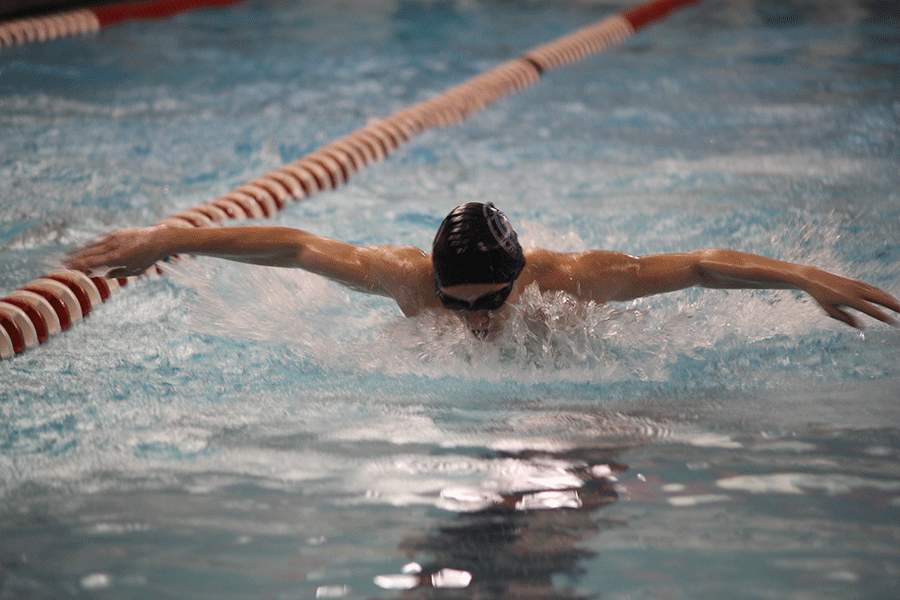 At+the+first+boys+swim+meet+of+the+year+at+Blue+Valley+West%2C+junior+Jeremiah+Kemper+competes+in+his+heat.+