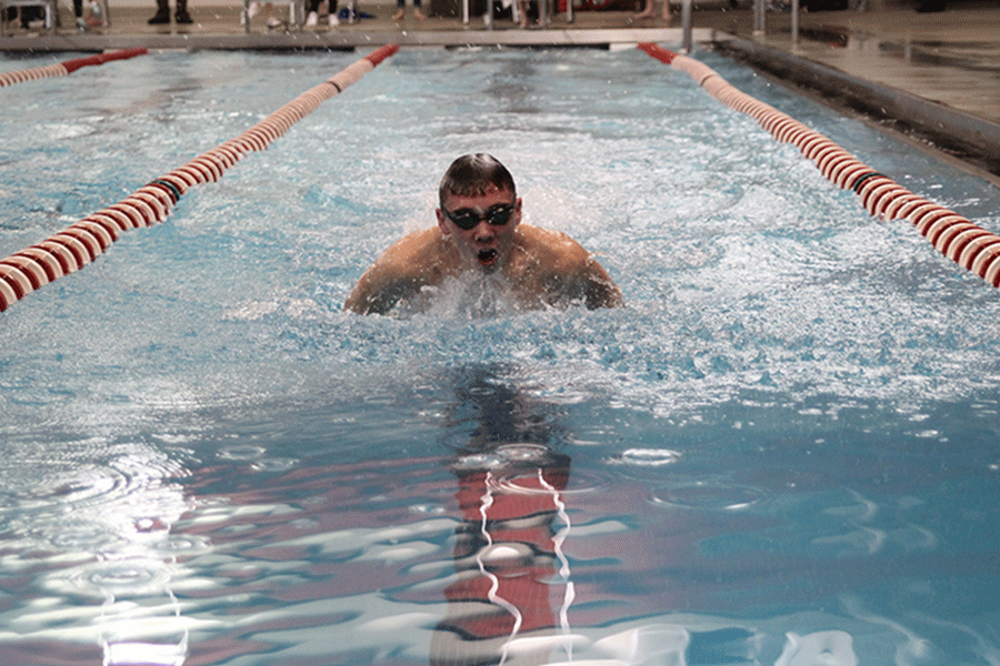 Junior Jeremiah Kemper participates in the IM relay at the Blue Valley West swim meet on Thursday, Jan. 29.