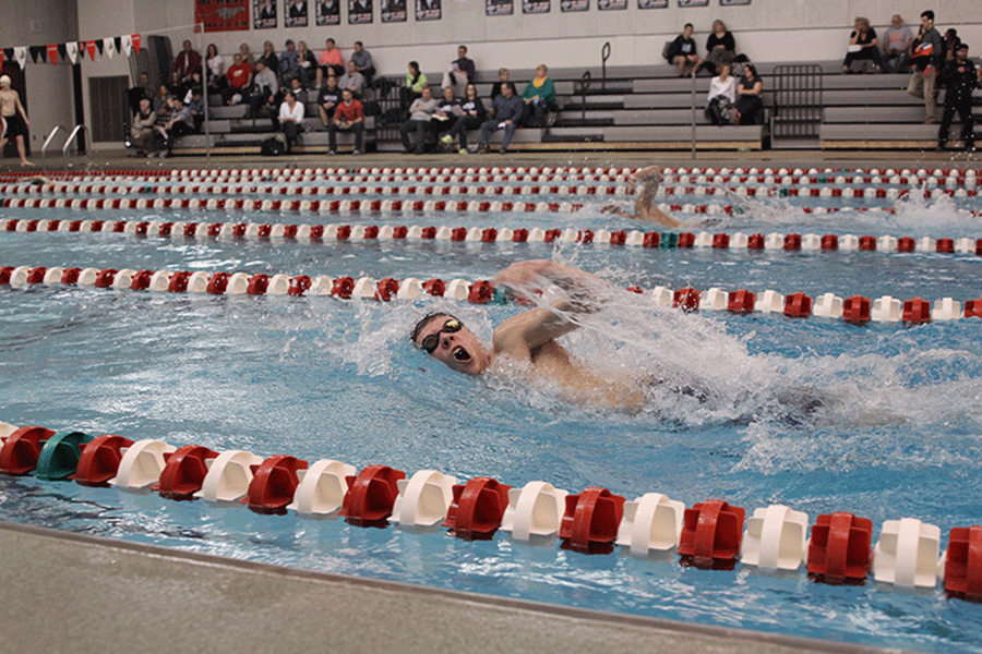 Junior Jeremiah Kemper competes in the 400 Yard Freestyle relay on Thursday, Jan. 29.