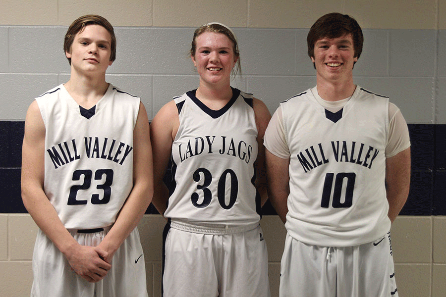 Freshman Cooper Kaifes, junior Catie Kaifes, and senior Connor Kaifes stand together between the two locker rooms; a common place for them to be found.