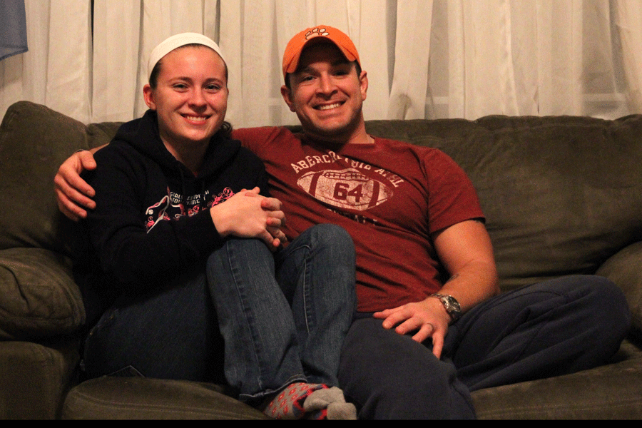 Sitting with her father George Ouellette, junior Brittany Ouellette makes a point to take advantage of every minute with her father now that he is home.