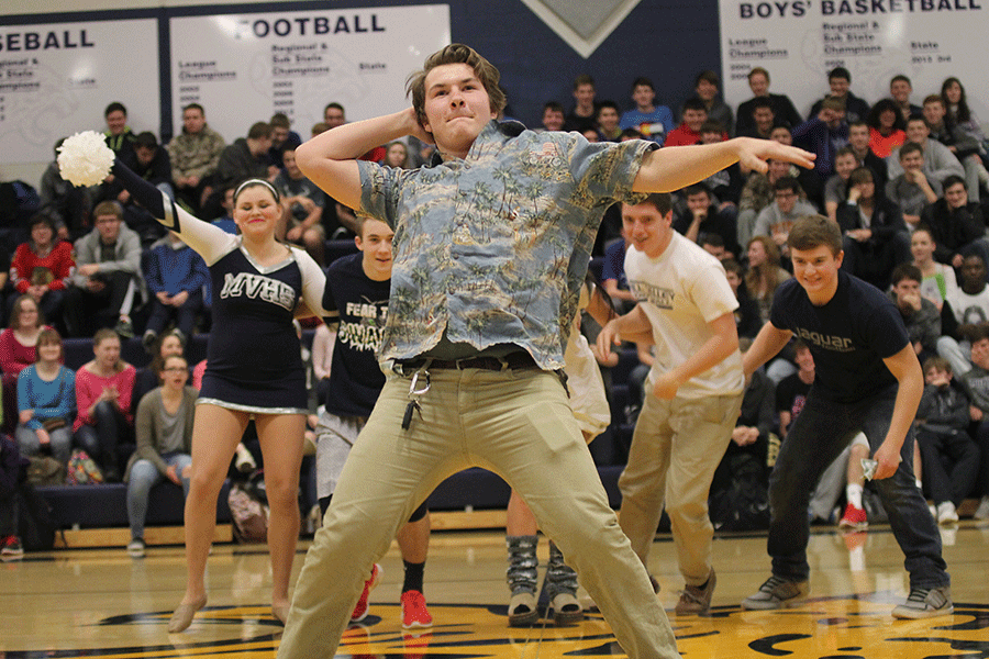 Sophomore Austin Garner does the sprinkler in the sophomore dance battle during the Winter Homecoming pep assembly on Friday, Jan. 16. The sophomores won the dance battle, beating out the freshmen, juniors and seniors.
