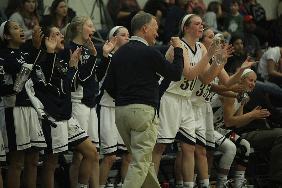 The Lady Jags cheer on their team during the basketball game on Tuesday, February 10 against the Lansing Lions.