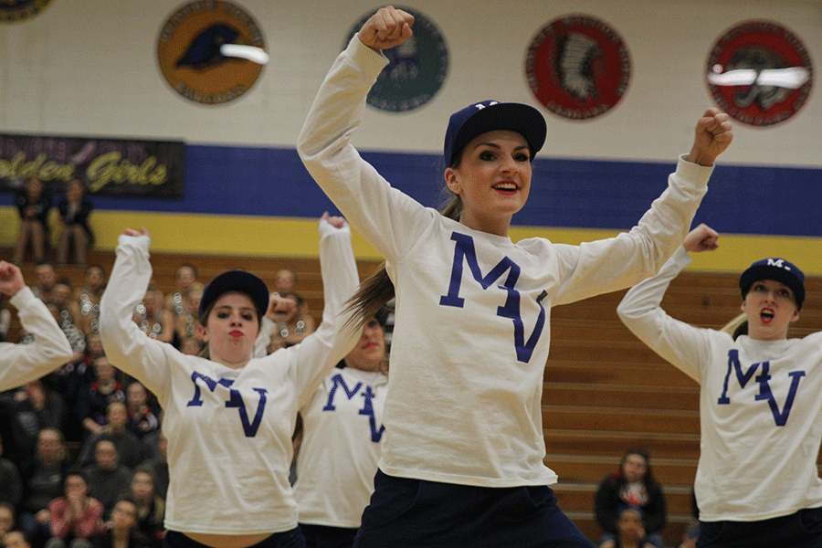 Senior Allison Eigsti dances with her teammates at the dance competition on Saturday, Jan. 17. 