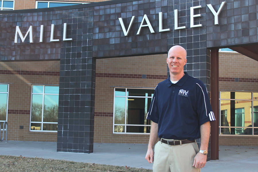 Communication arts teacher Justin Bogart, also called Mr. Mill Valley by many teachers and faculty members, stands in front of Mill Valley on Tuesday, Feb. 10.
